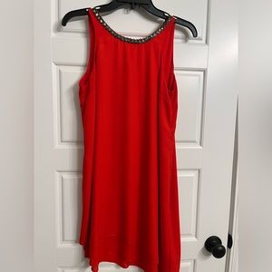Red asymmetrical dress with beaded neck. Size small